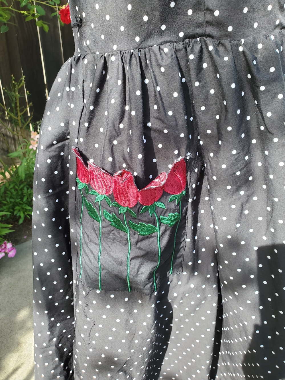 Black Polka Dot Sleeveless Casual Dress with Red Rose Accents - Picture 2 of 6